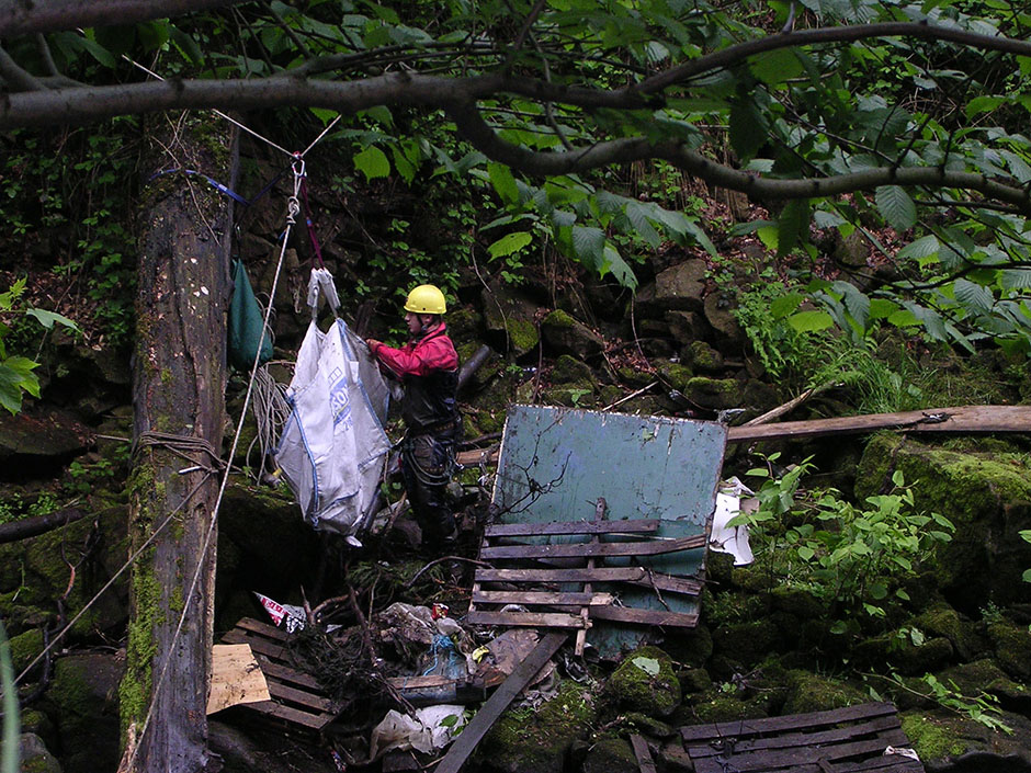 Up and Under abseiling clean up team at Hoghton Bottoms, Lancashire.